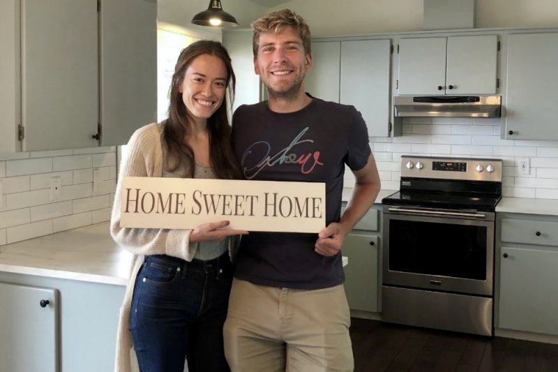 Couple Standing In A New Home
